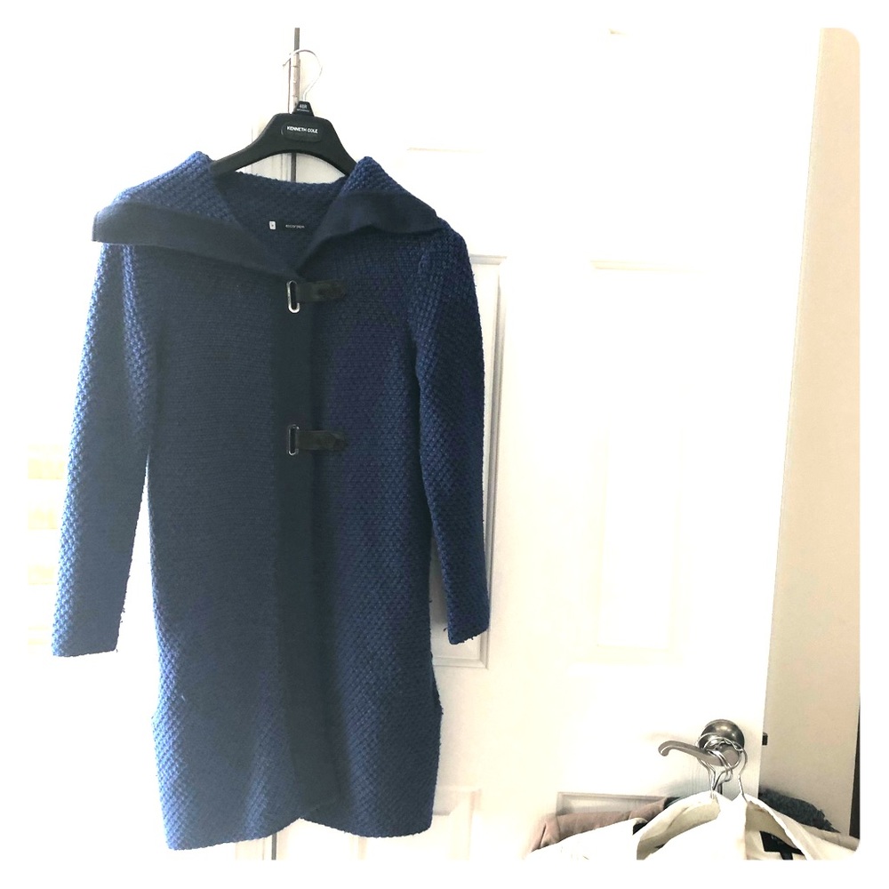 Dark teal knitted Spanish coat clasps and pockets